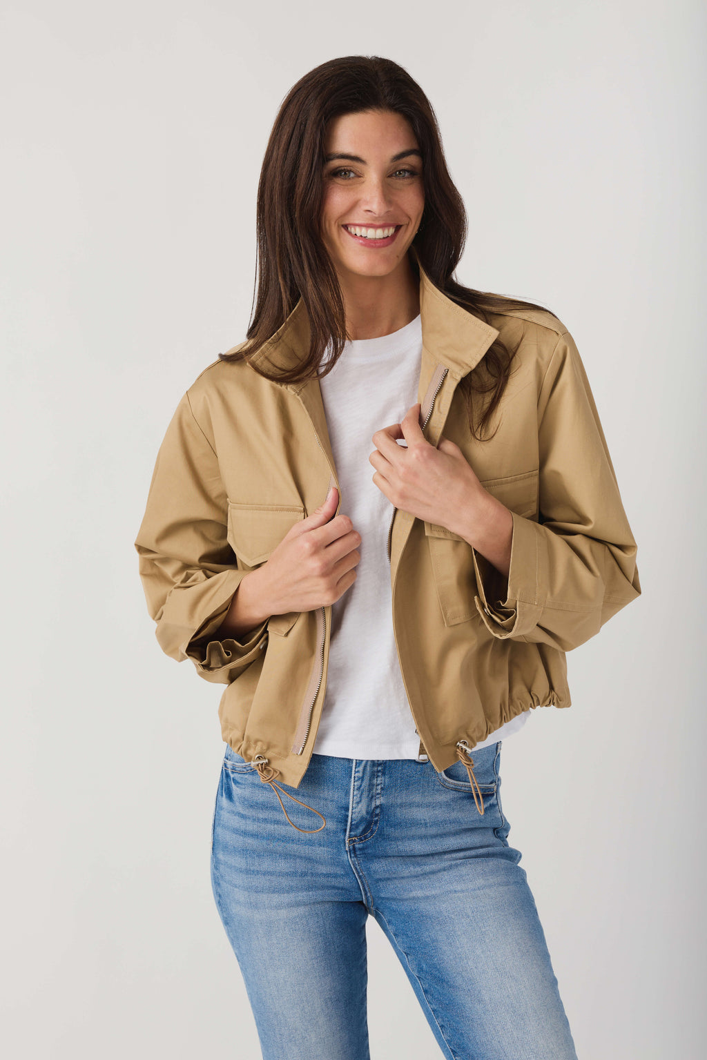 Khaki beige utility short jacket with snap-front closure and flap pockets
