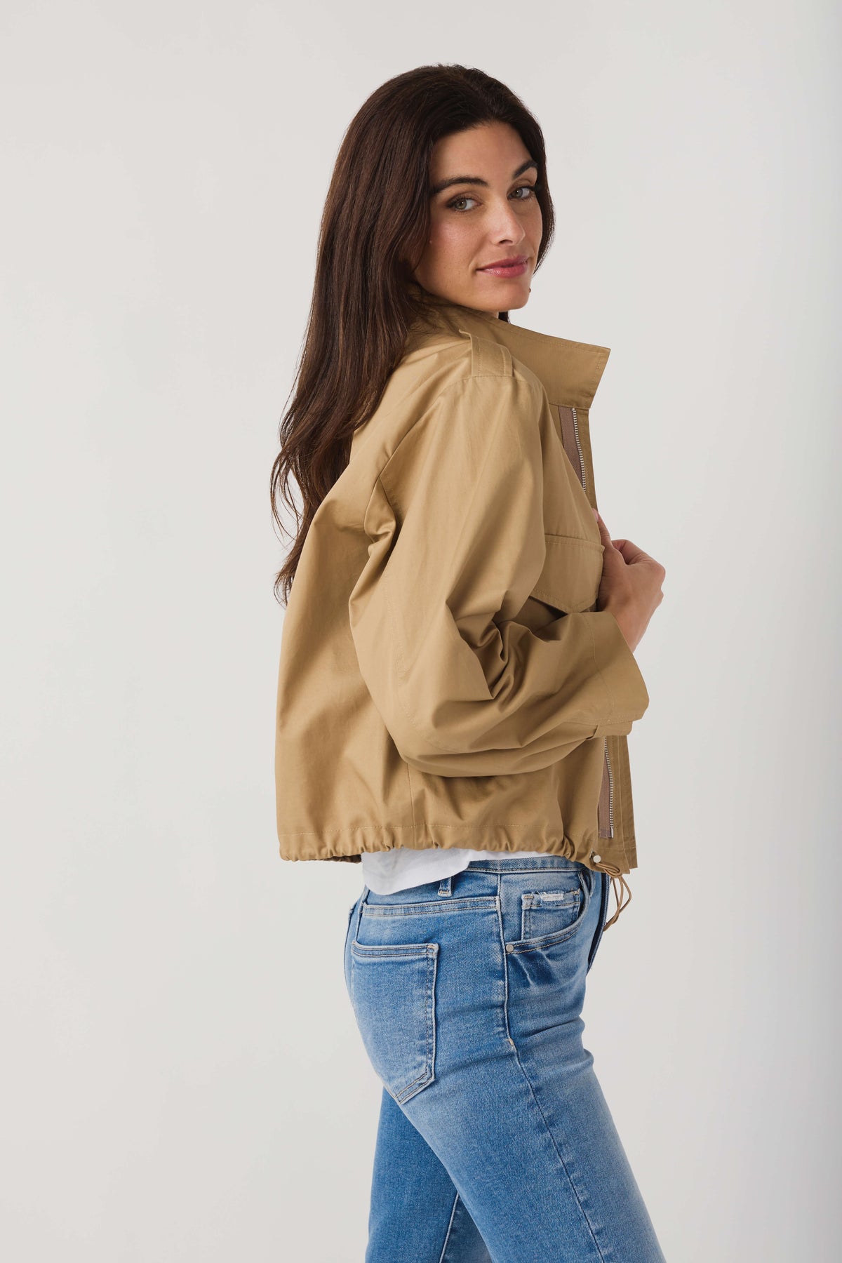 Khaki beige utility short jacket with high collar, flap pockets, cuffed sleeves