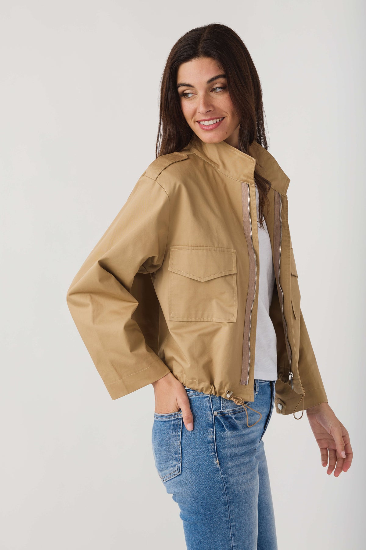 Khaki beige utility short jacket with flap pockets and drawstring waist hem