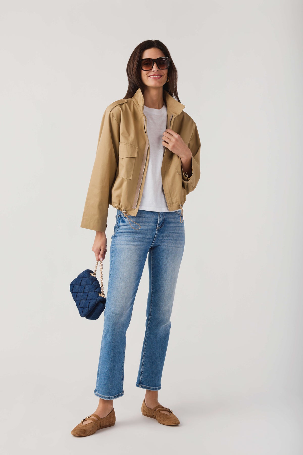 Khaki beige cropped utility jacket with flap pockets and drawstring hem