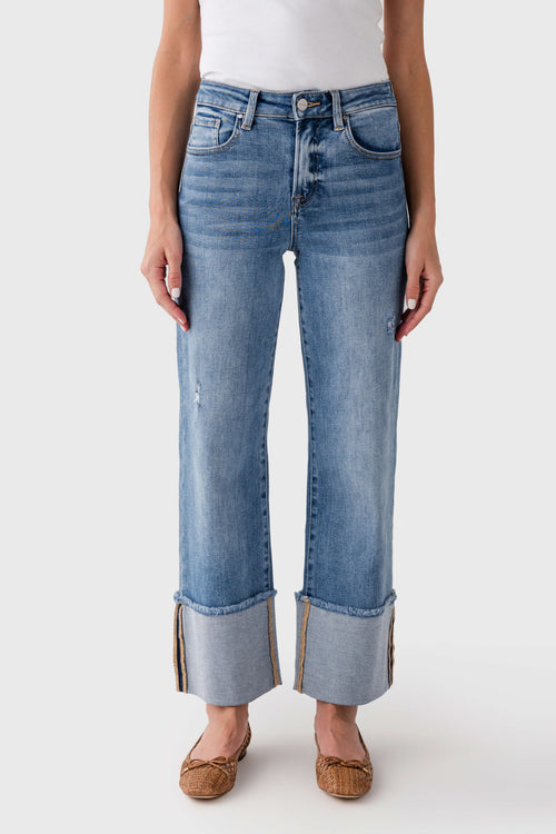 Medium-wash cuffed jeans front view with belt loops and classic five-pocket styling