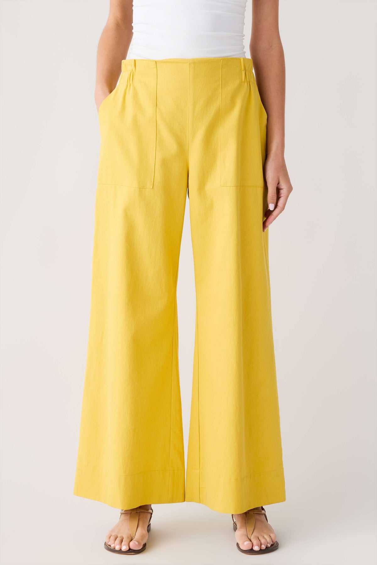Mustard yellow wide-leg pants with elastic waistband
