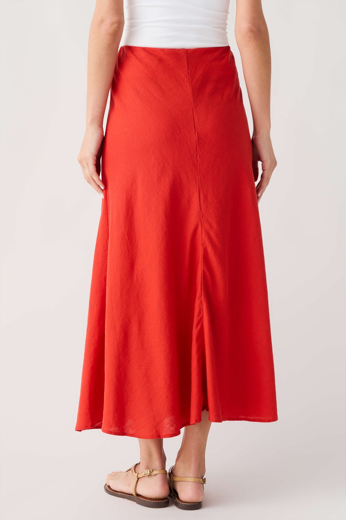 Red midi skirt with front seam detail and gently flared skirt hem