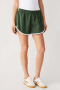 Green athletic shorts with white trim and elastic waistband