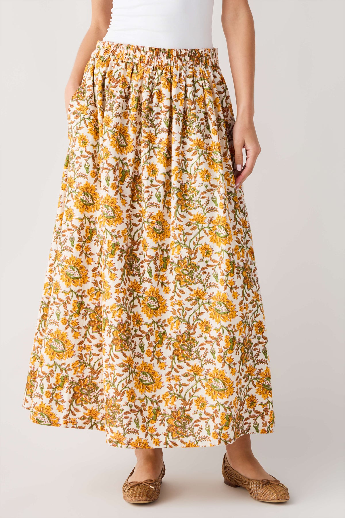 Floral print maxi skirt in yellow green with elastic waistband and gathered silhouette