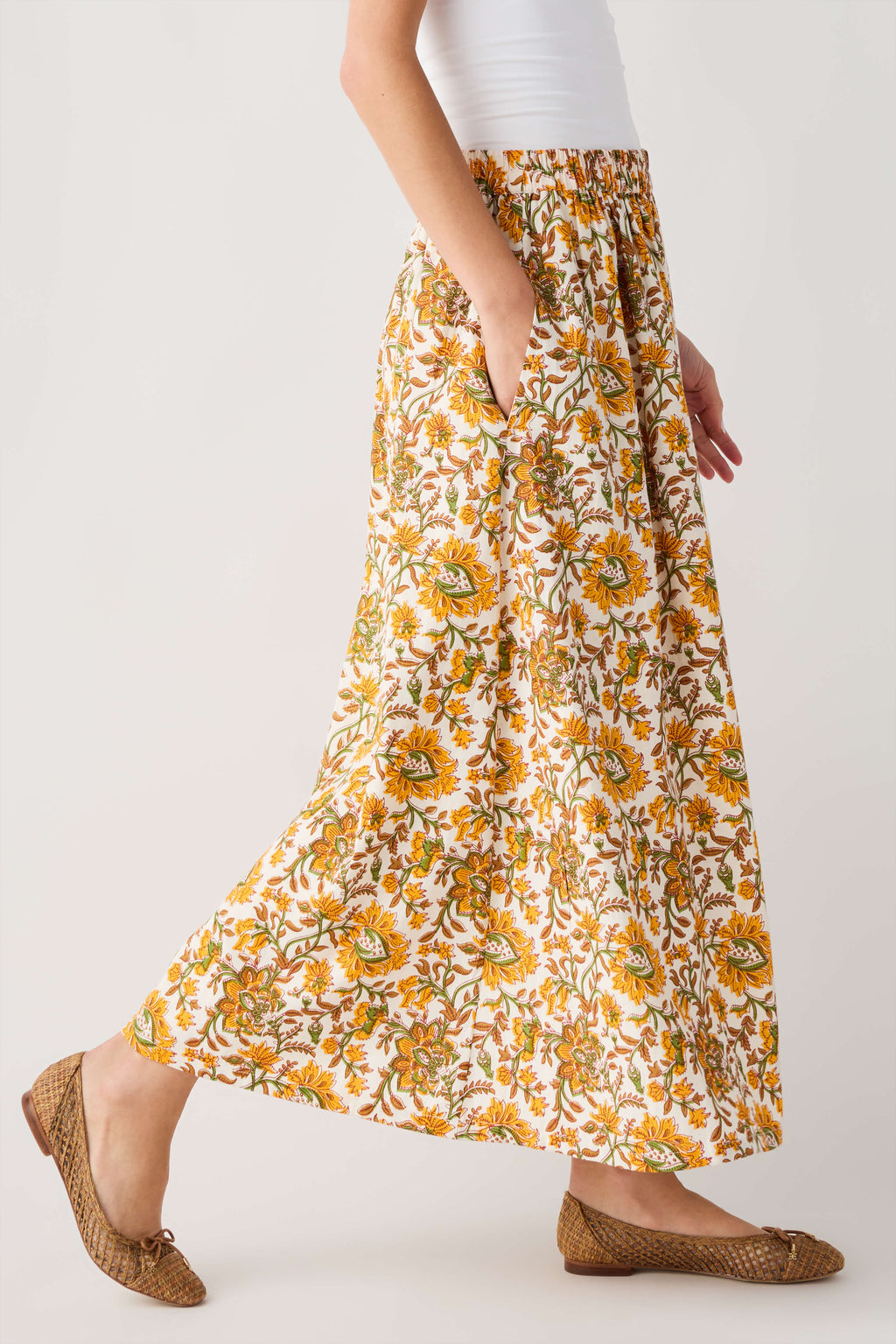 Yellow green floral maxi skirt with elastic waist and flowing gathered drape