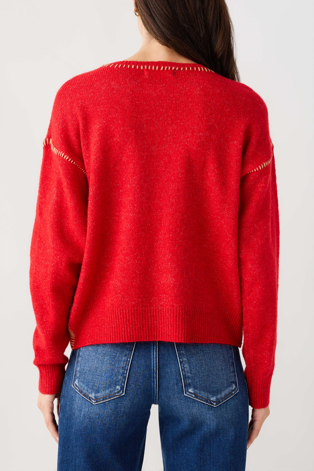 Red crewneck sweater with contrast stitch detailing on back yoke and sleeves