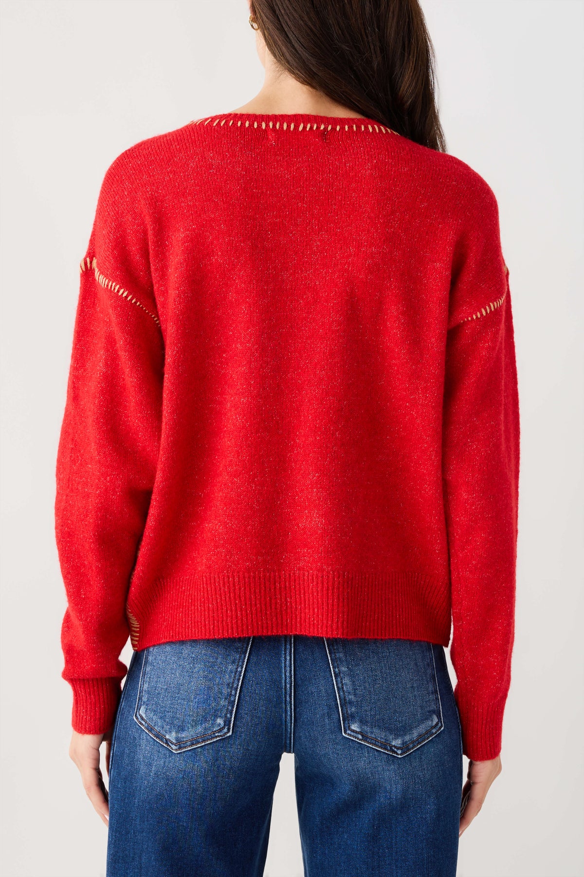 Red crewneck sweater with contrast stitch detailing on back yoke and sleeves