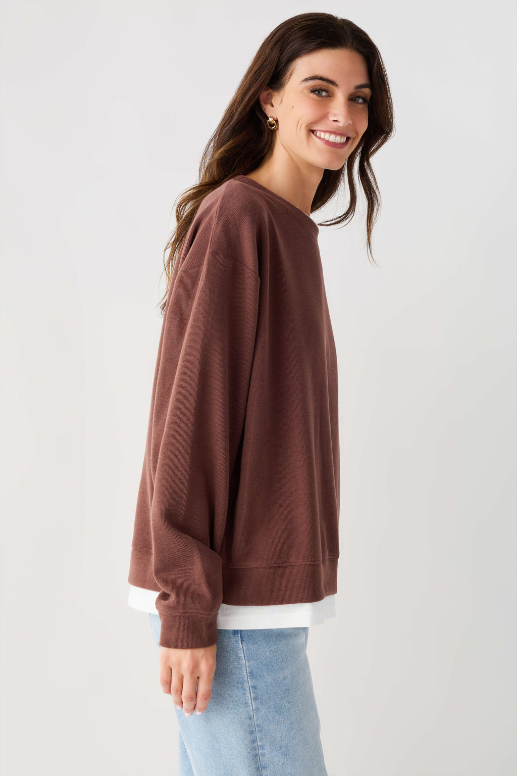 Chocolate brown crew pullover with crew neck, long sleeves, and ribbed hem