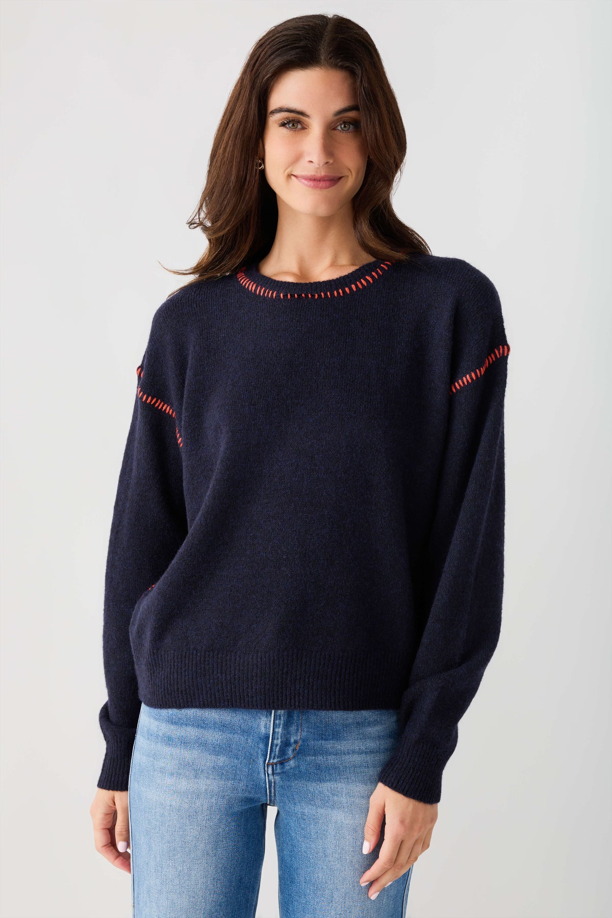 Navy crewneck sweater with contrast stitch sleeves and ribbed hem