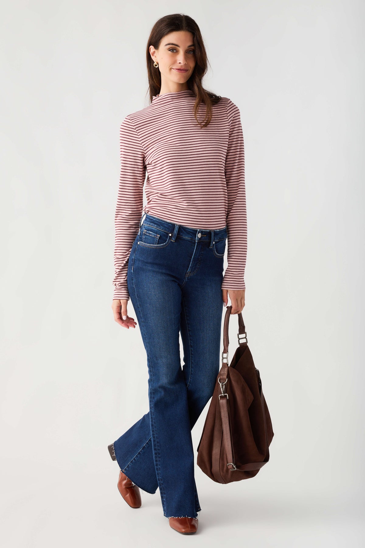 Mauve-and-white striped mockneck knit top with long sleeves, front view