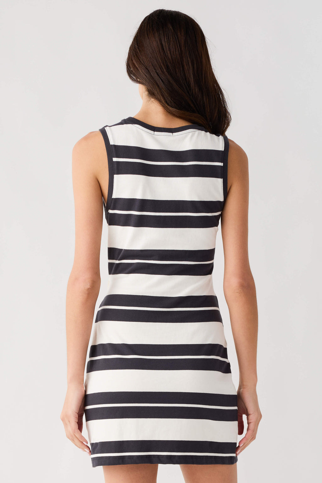 Back view of sleeveless striped mini dress, black and white horizontal stripes