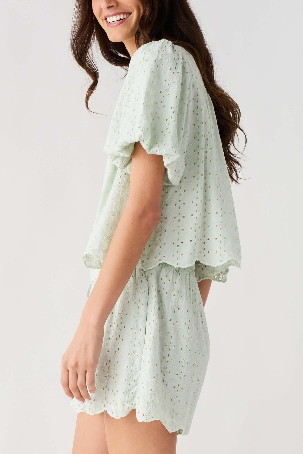 Mint eyelet lace top and shorts set with side drape, tiered ruffle hem and puff sleeves