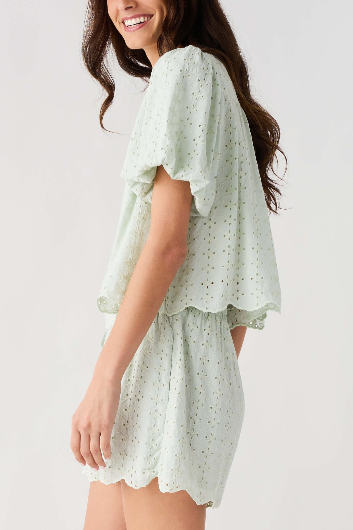 Mint eyelet lace top and shorts set with side drape, tiered ruffle hem and puff sleeves