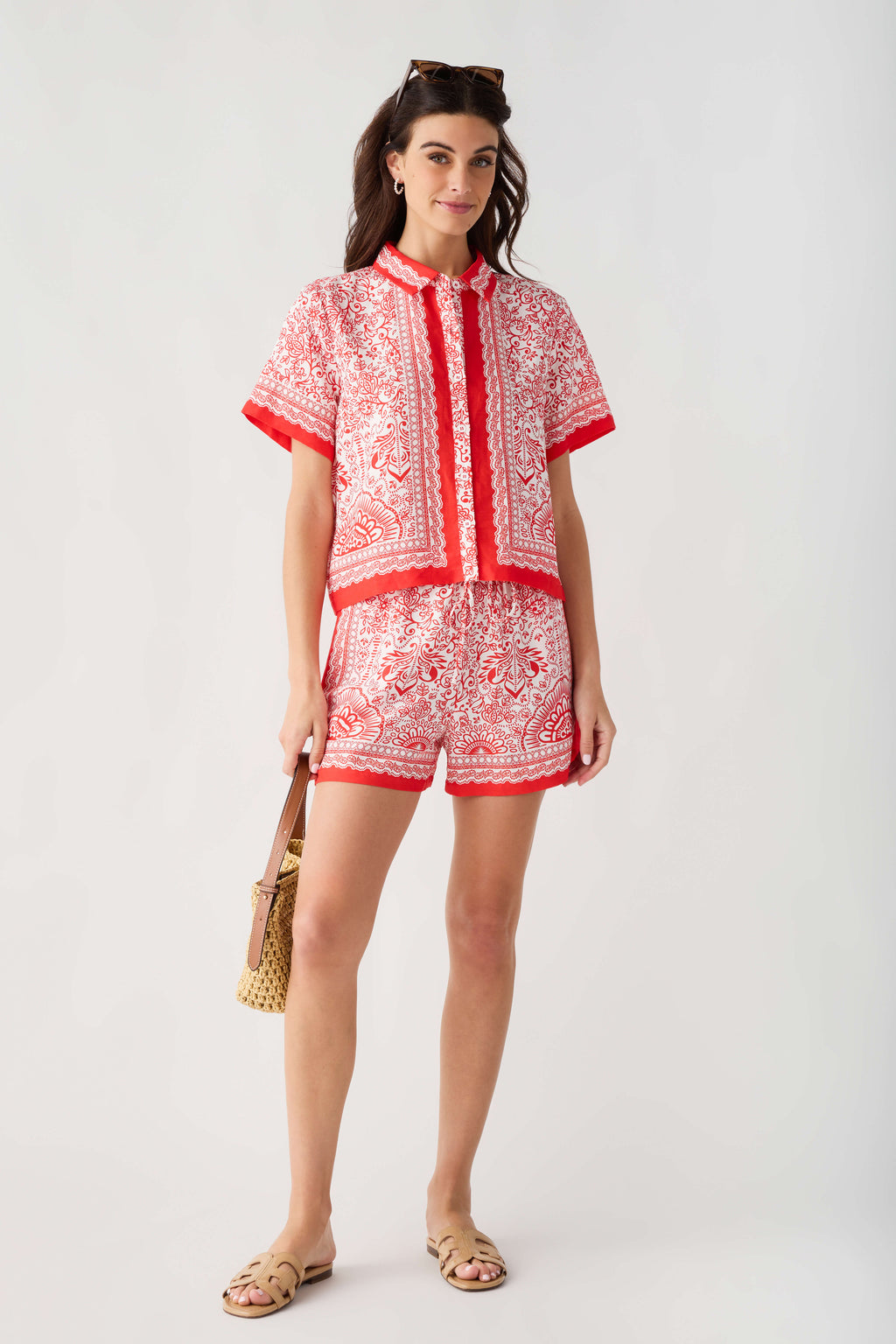 Red and white border-print short set: button-front top and matching shorts