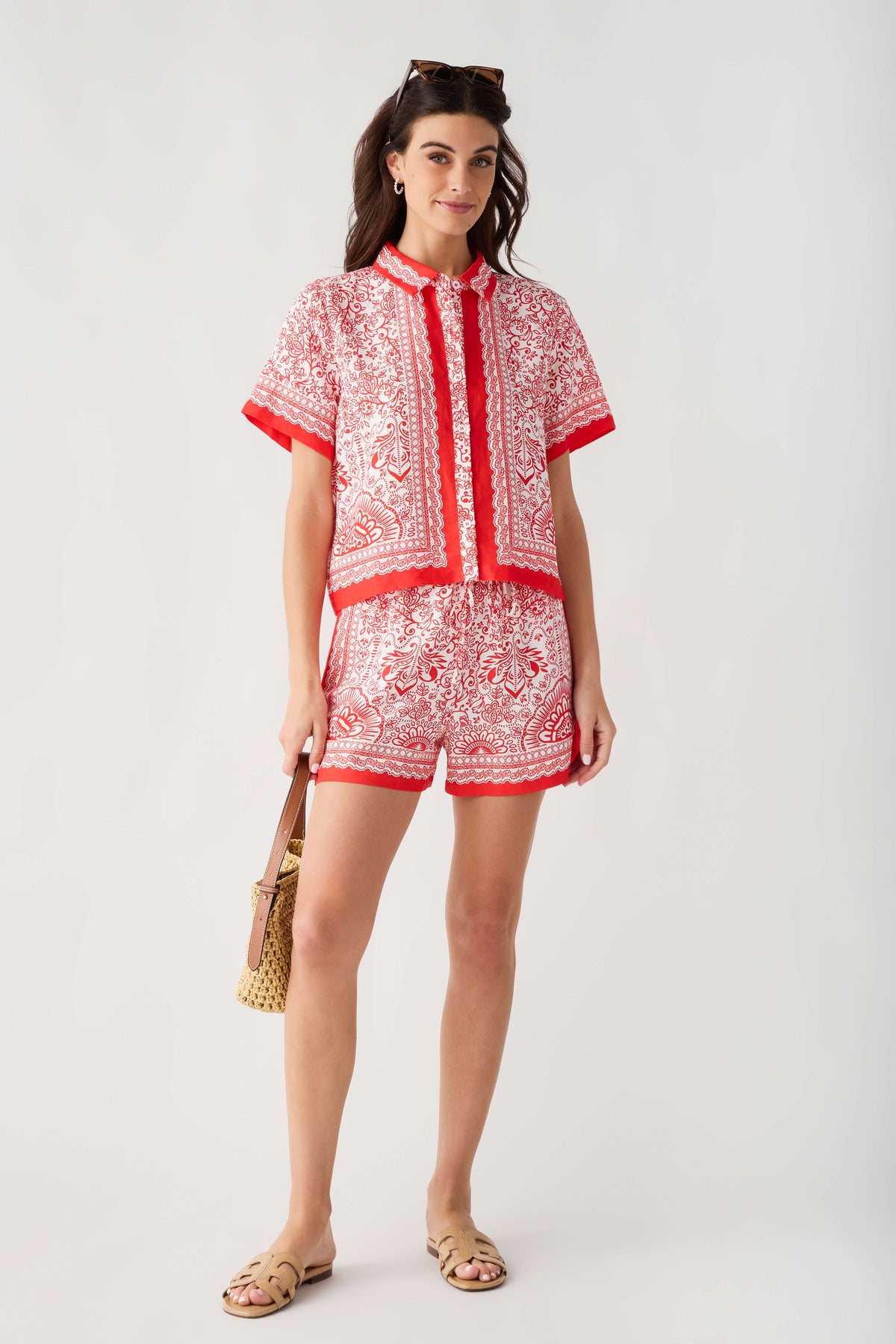 Red and white border-print short set: button-front top and matching shorts