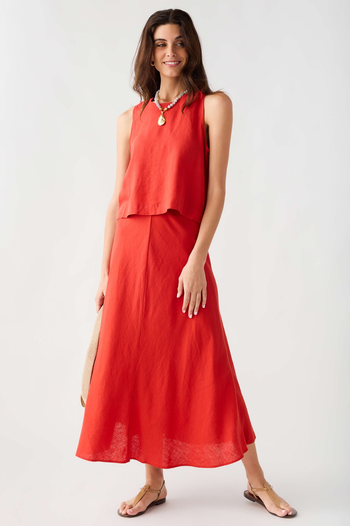Red midi A-line skirt with smooth waistband and softly flared hemline
