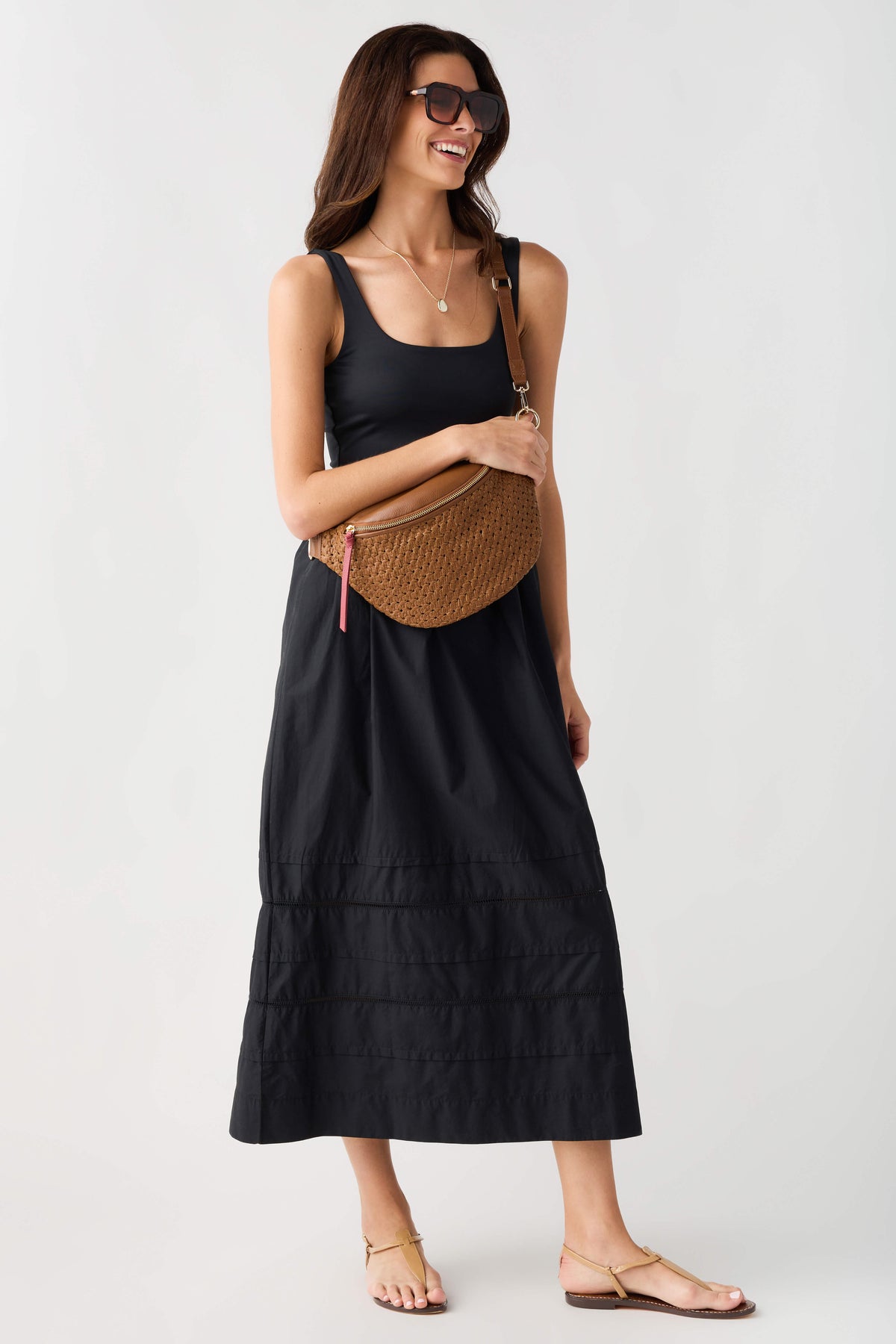 Black sleeveless midi dress with square neckline and tiered panels