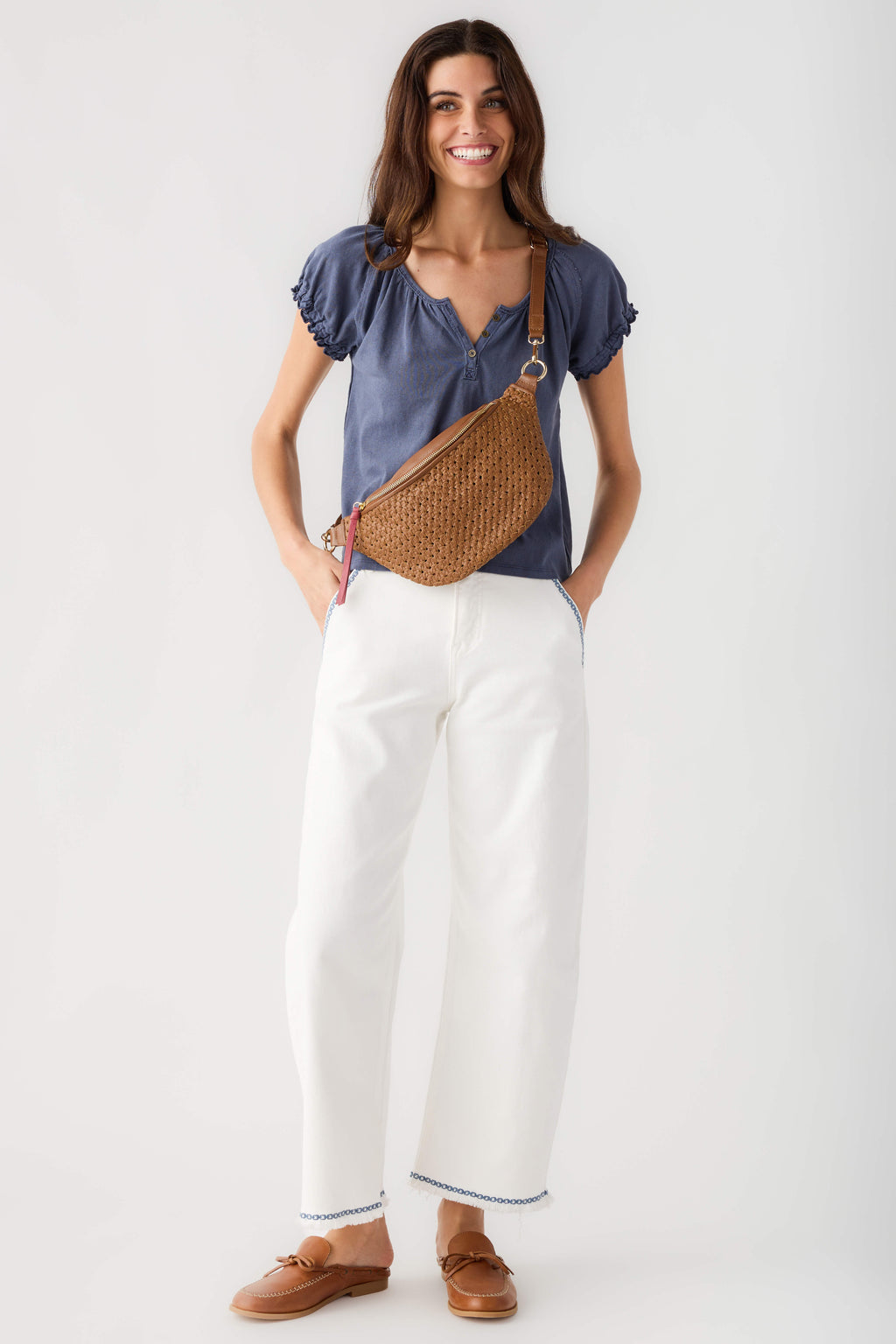 Cream embroidered cropped barrel jeans with blue trim, ankle-cropped silhouette
