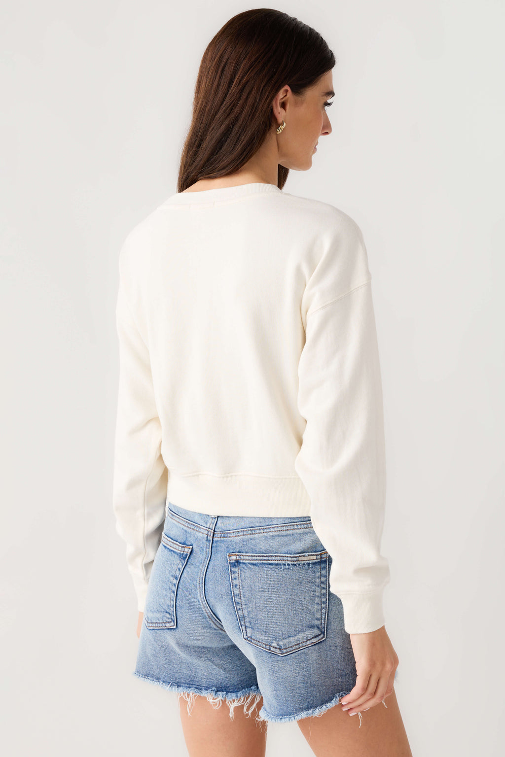Cloud crewneck sweatshirt, back view showing crew neckline and ribbed cuffs