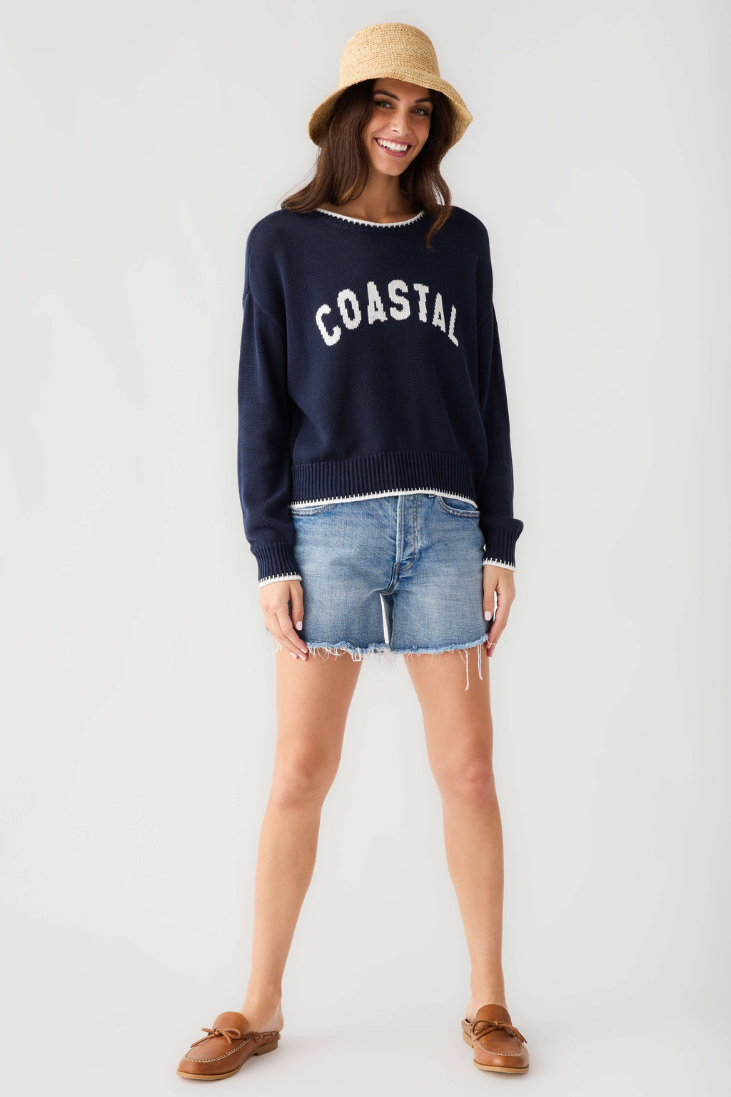Navy knit crewneck sweater with 'COASTAL' front graphic and white neckline trim