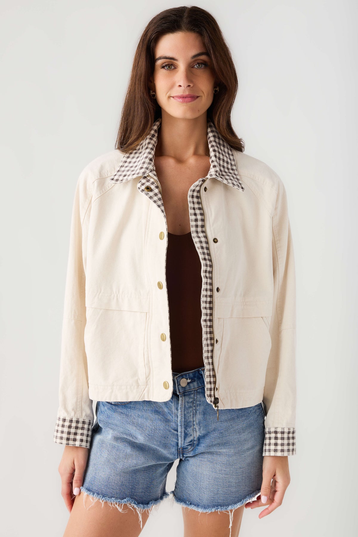 Beige twill jacket with gingham collar and cuffs, front button closure
