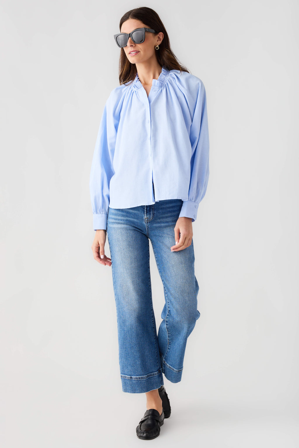 Light blue ruffle button-down top with gathered neckline and long balloon sleeves