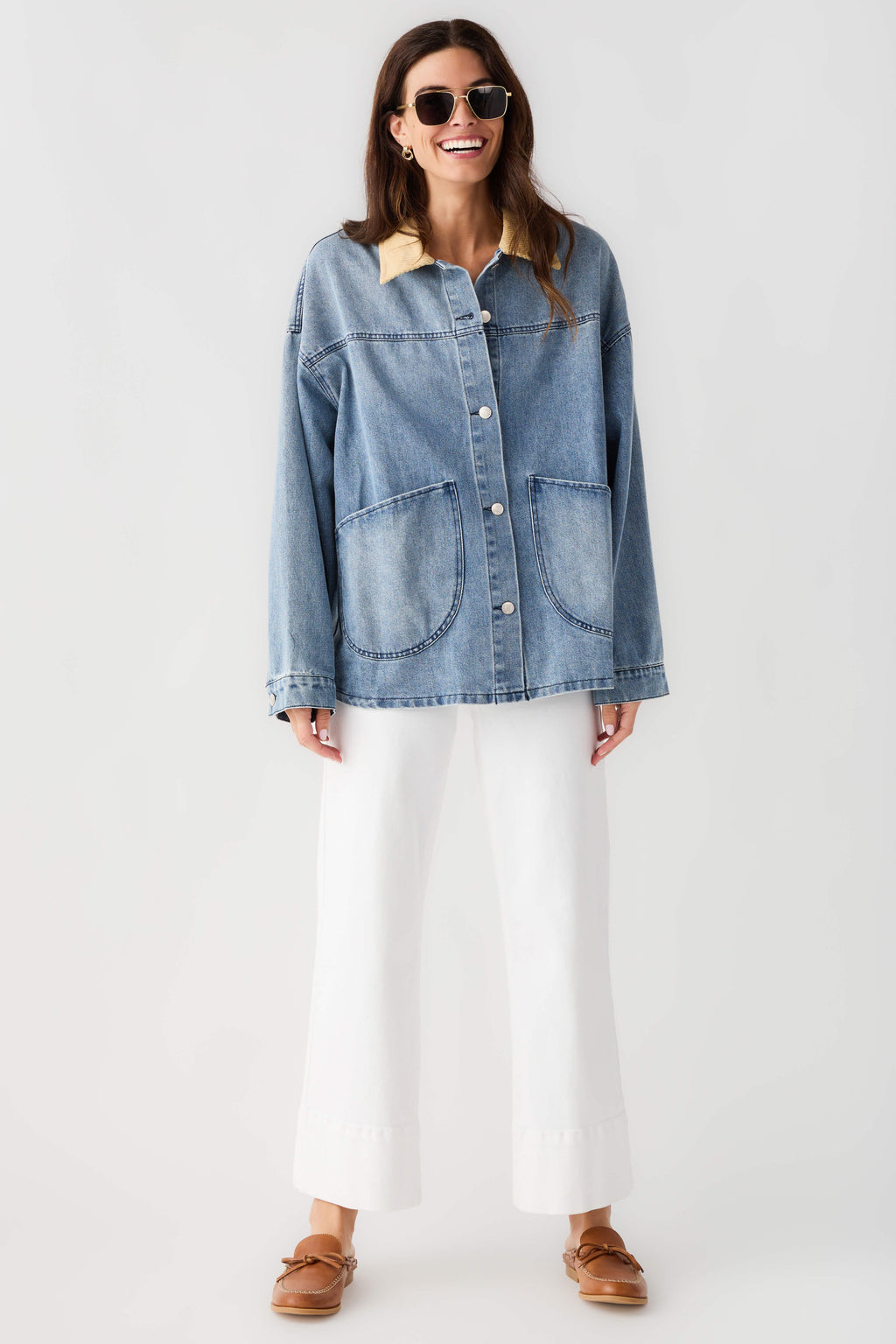 Light blue denim jacket with tan corduroy collar, button-front and chest pockets
