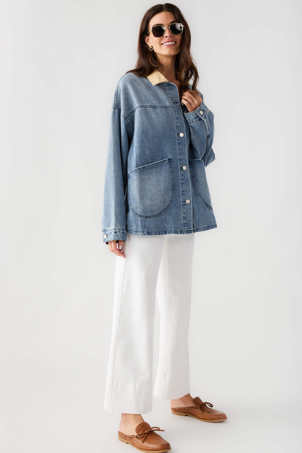 Light blue denim jacket with tan corduroy collar, button-front and chest pocket detail