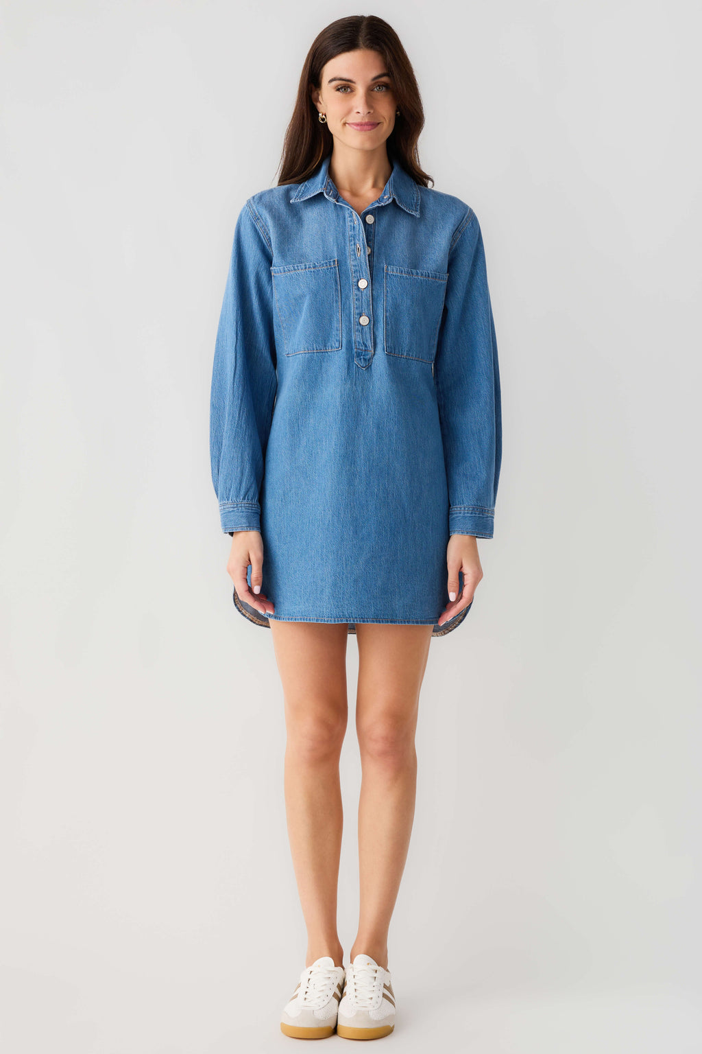 Blue denim shirt dress with point collar, button front and chest pocket, long sleeves.