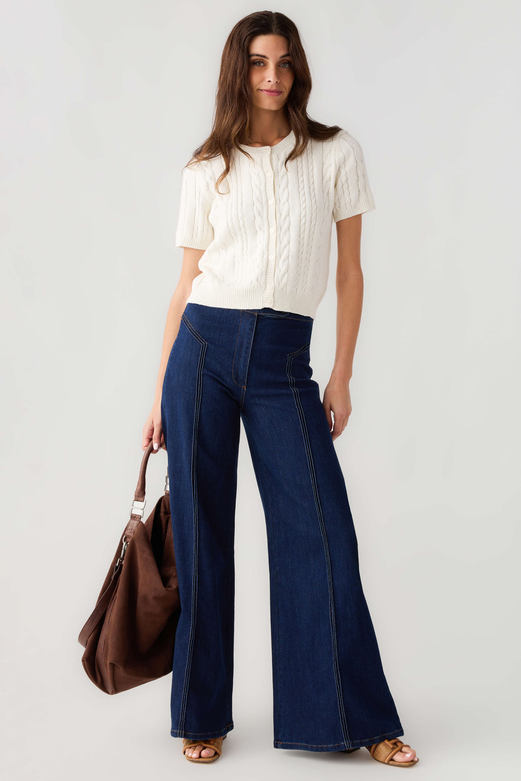 Off-white cable-knit short-sleeve cardigan, button-front top view