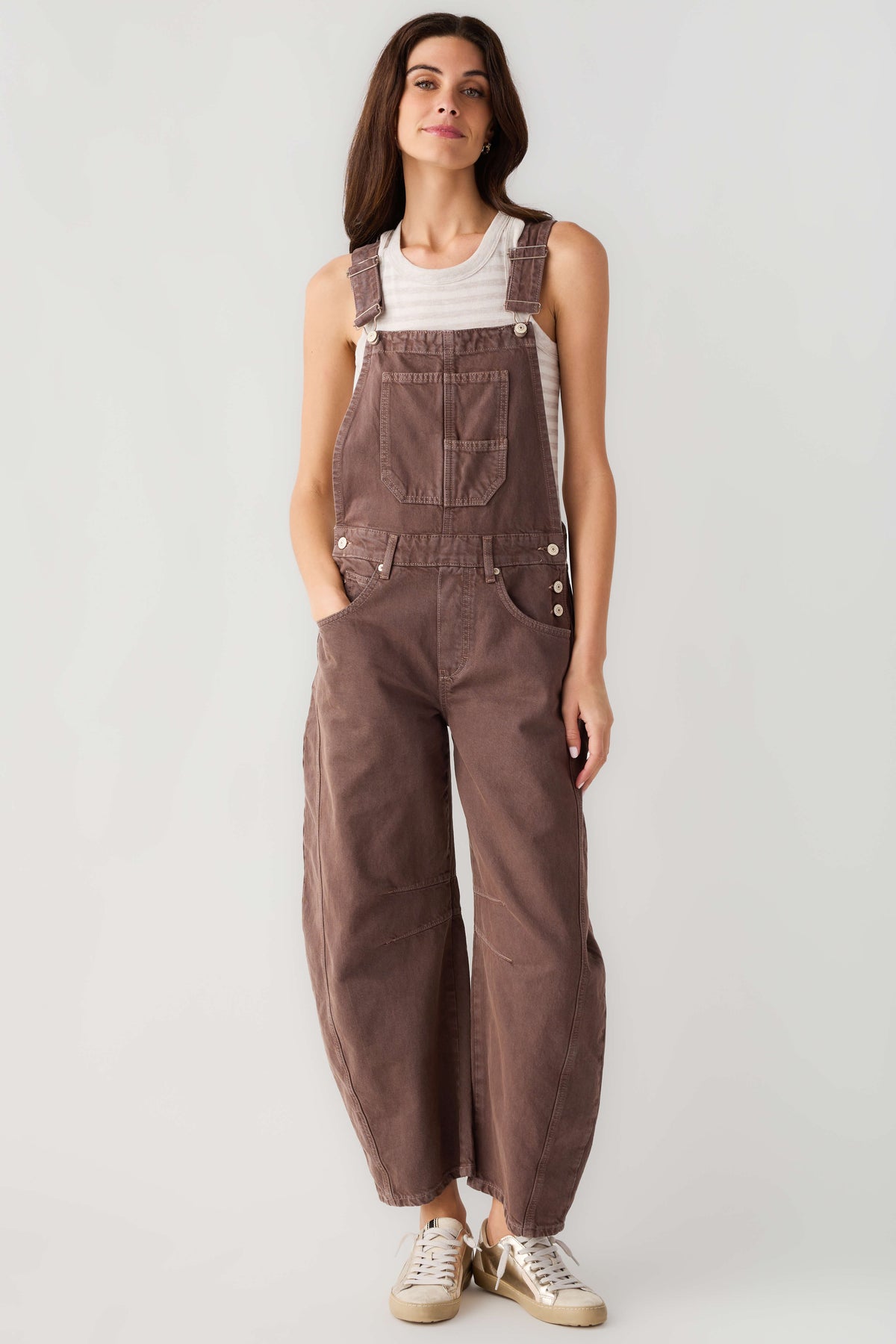 Chocolate brown denim overalls with adjustable straps, bib pocket, and buttoned chest detail