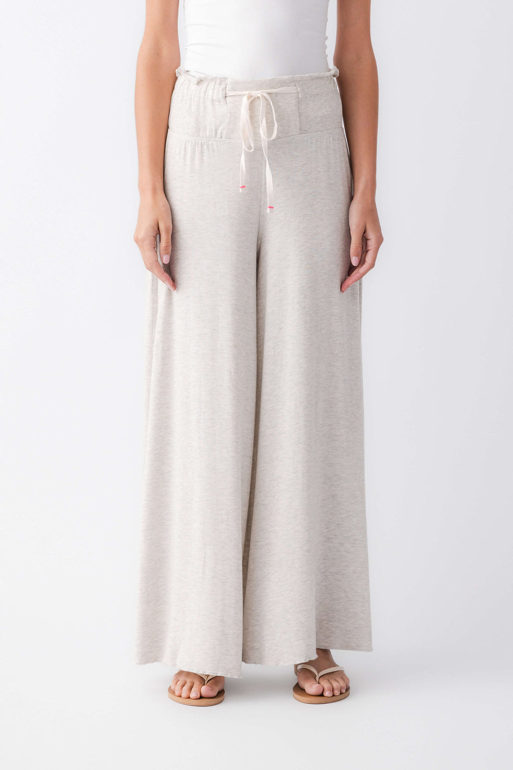 Heather grey wide-leg pants with elastic waistband and drawstring ties
