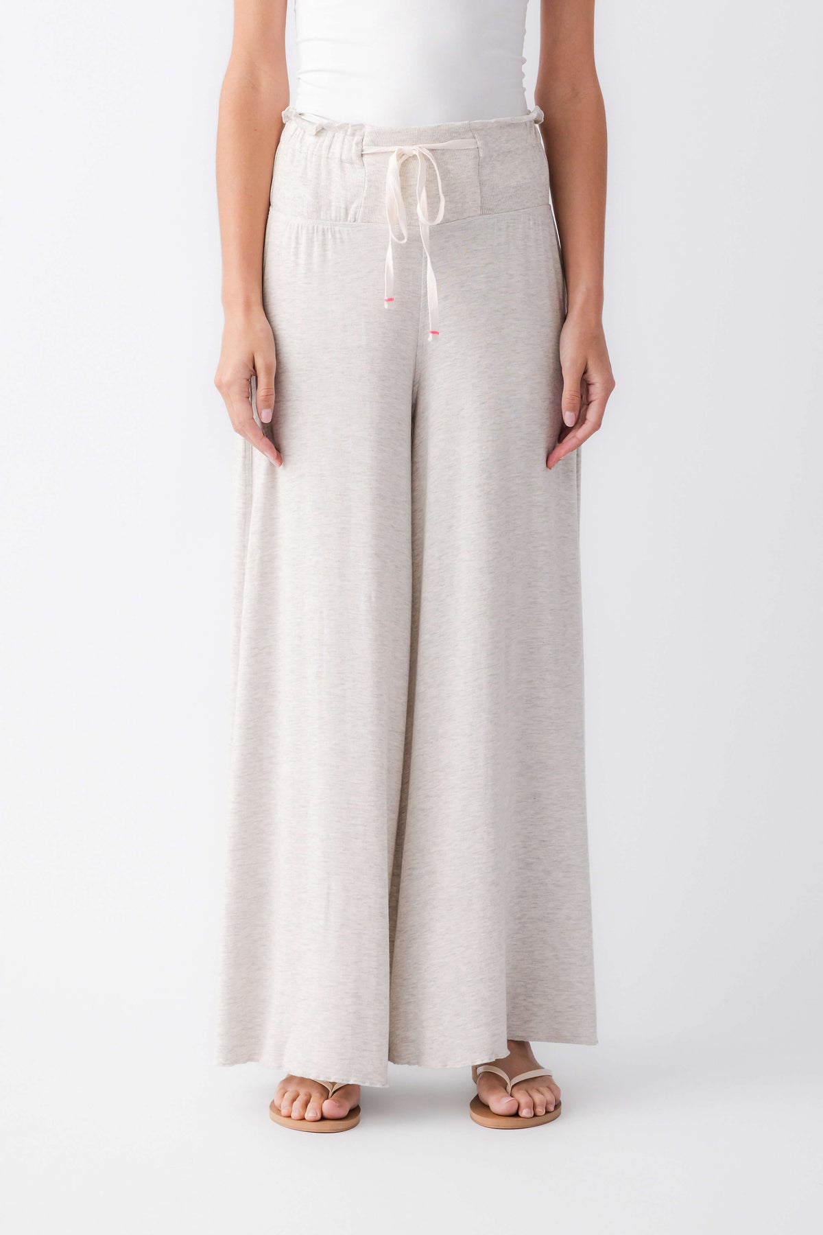 Heather grey wide-leg pants with elastic waistband and drawstring ties