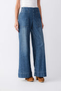 Blue denim pull-on wide-leg pants with front patch pockets and flared hems