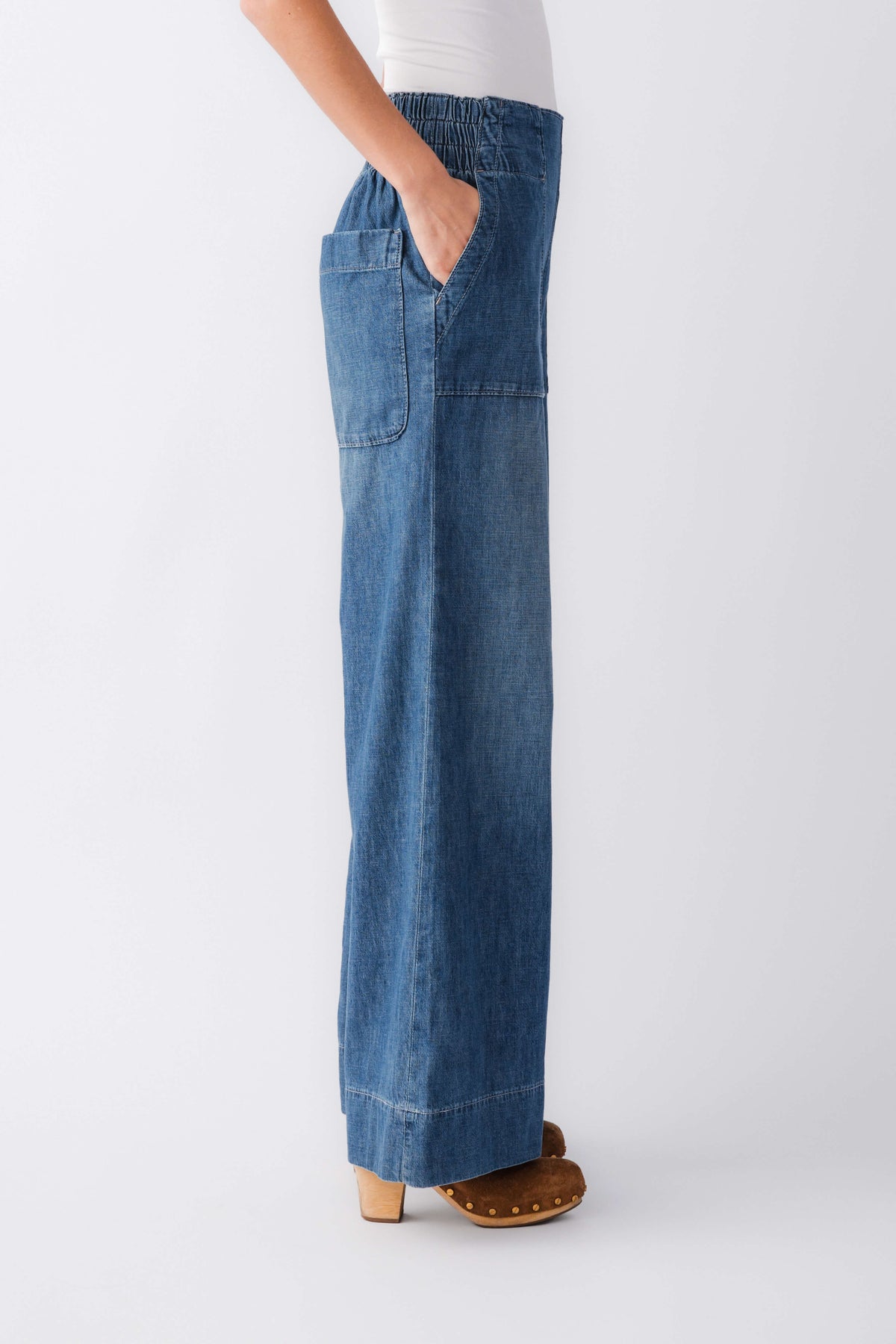 Blue denim pull-on wide-leg pants with elastic waist and patch front pockets