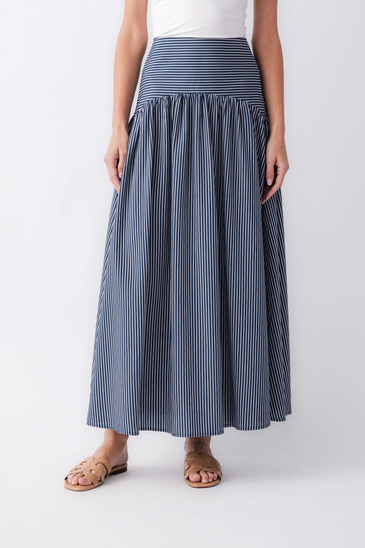 Blue-and-white striped maxi skirt with elastic waistband and gathered pleated tier