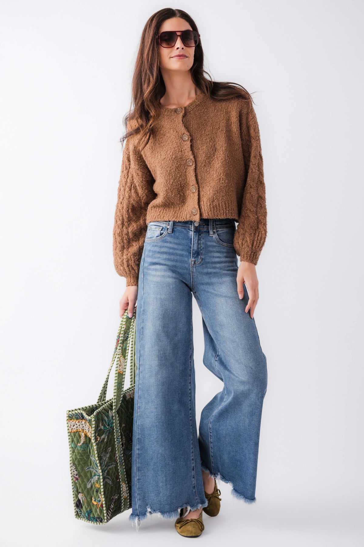Brown knit cardigan with button front and long balloon sleeves