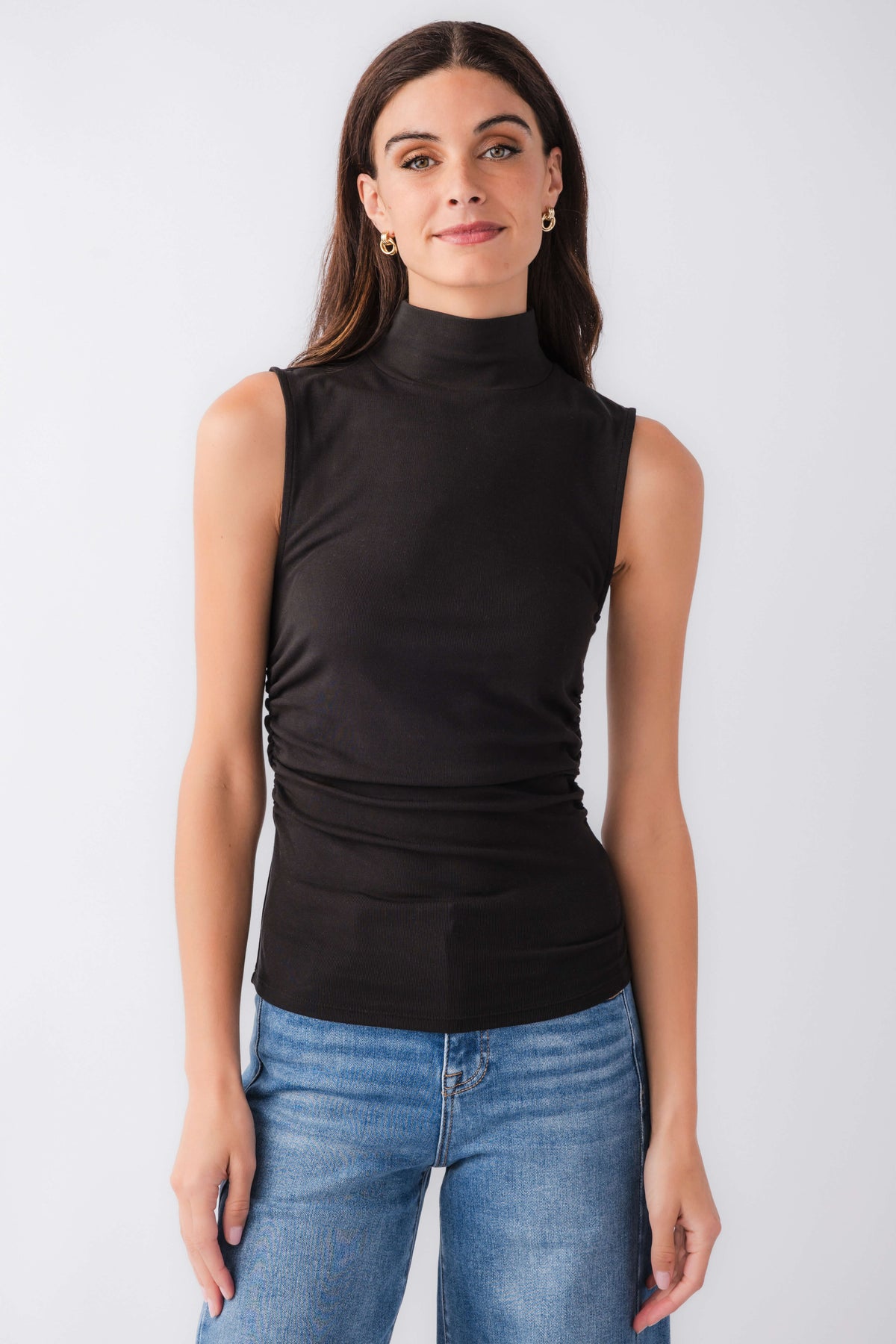 Black sleeveless high-neck tank top, smooth knit with fitted waist