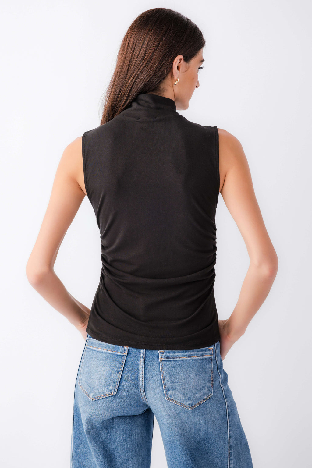 Black sleeveless high-neck tank top, back view with high collar and fitted waist