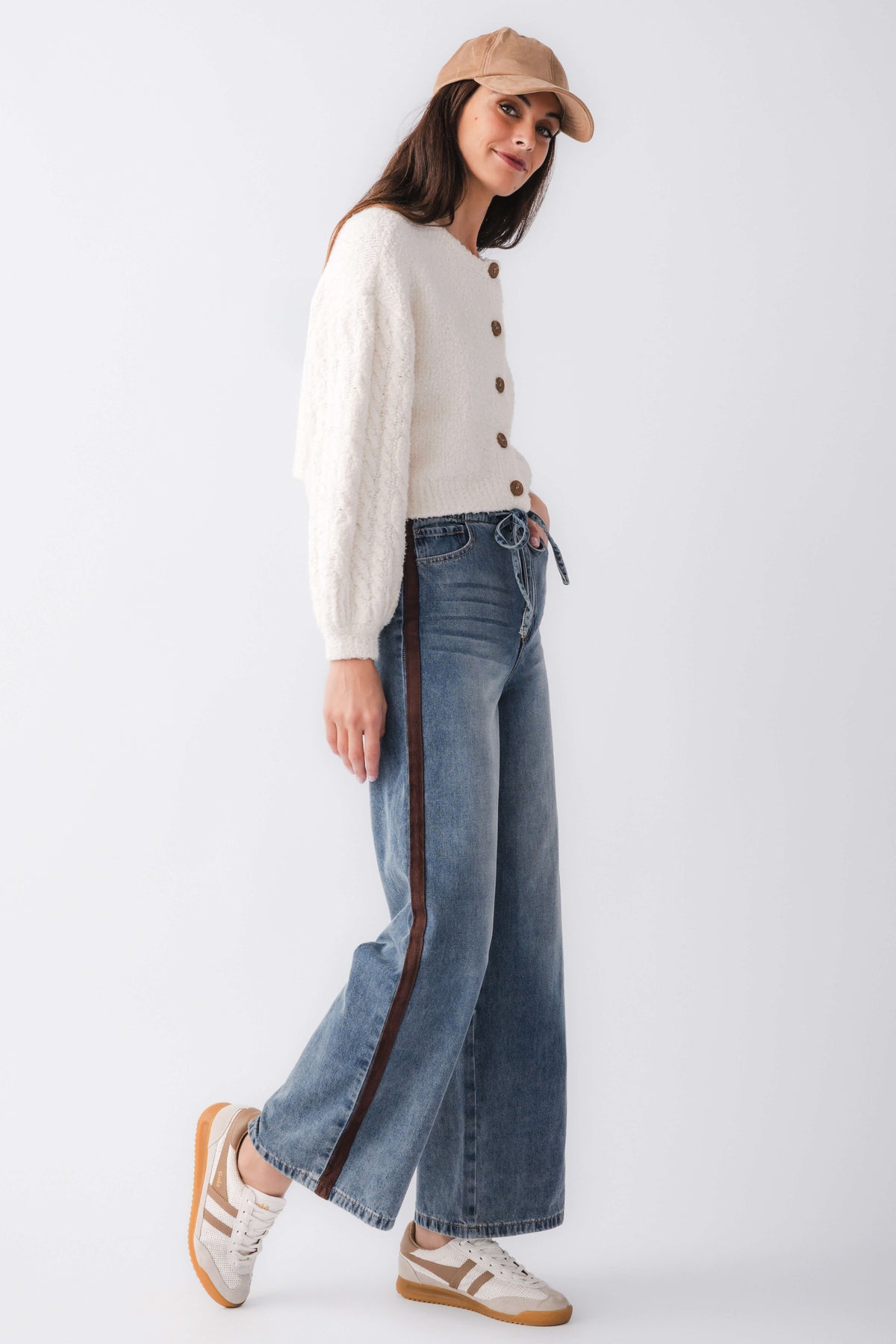 White knit cardigan with button front and long balloon sleeves