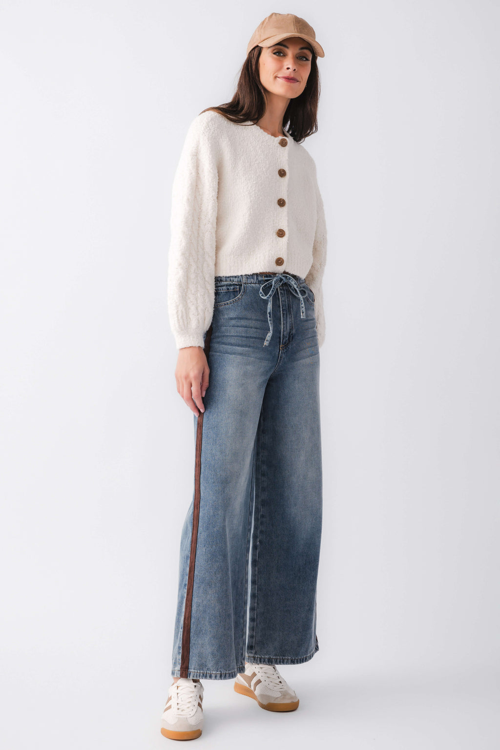 White button-front cardigan with textured knit and ribbed cuffs