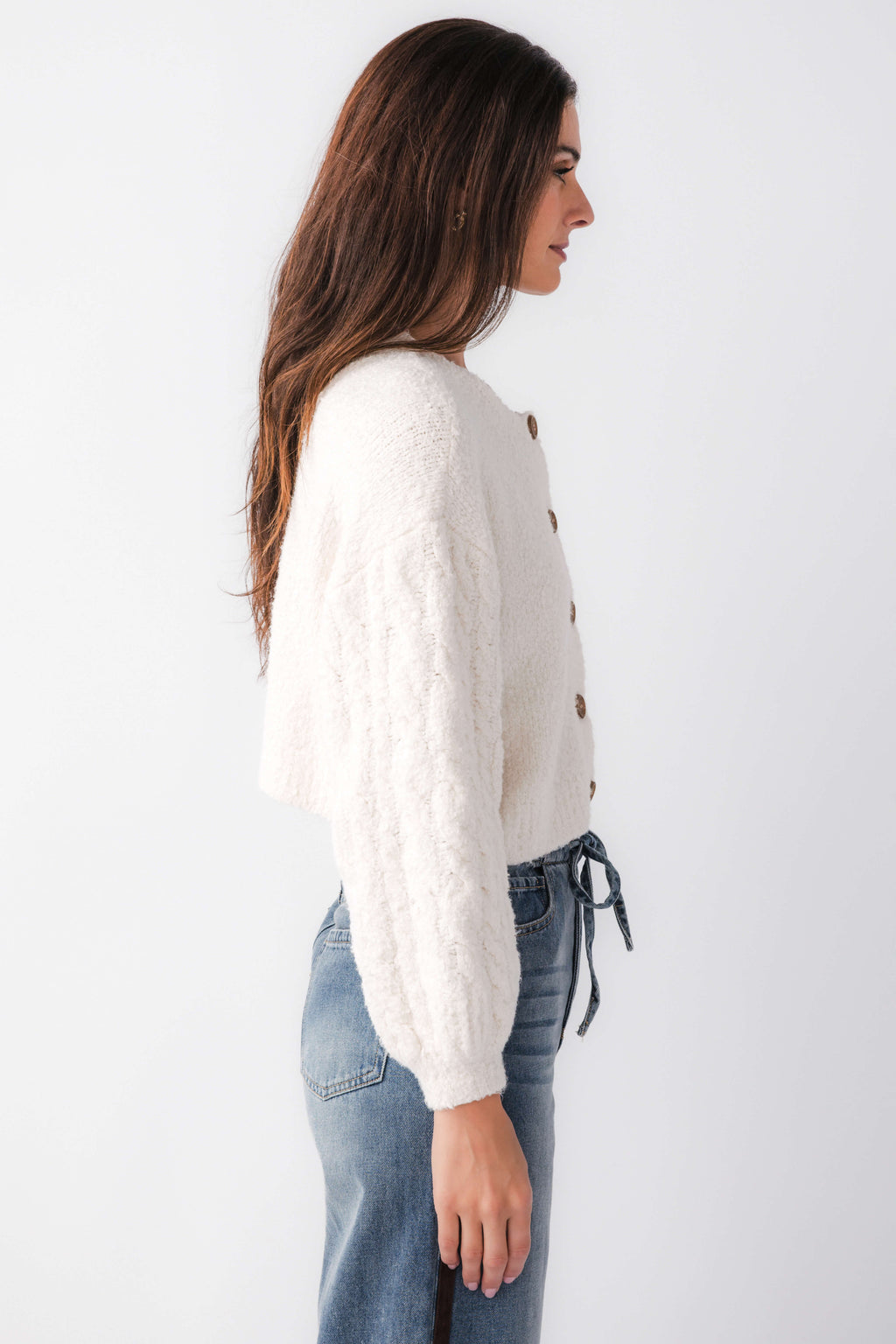 White fuzzy knit cardigan with button front and long sleeves