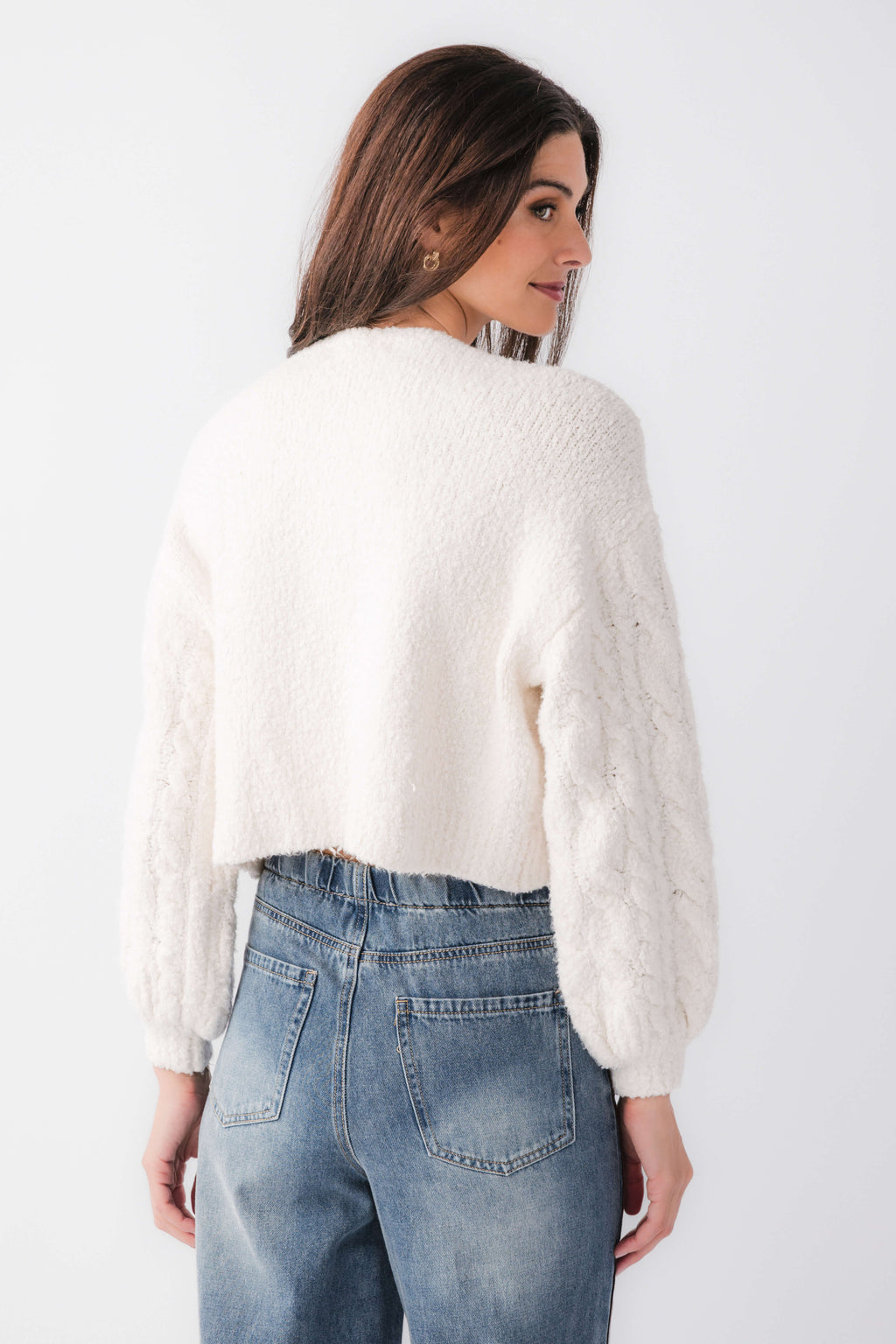 White fuzzy knit cardigan with button front, long sleeves, back view