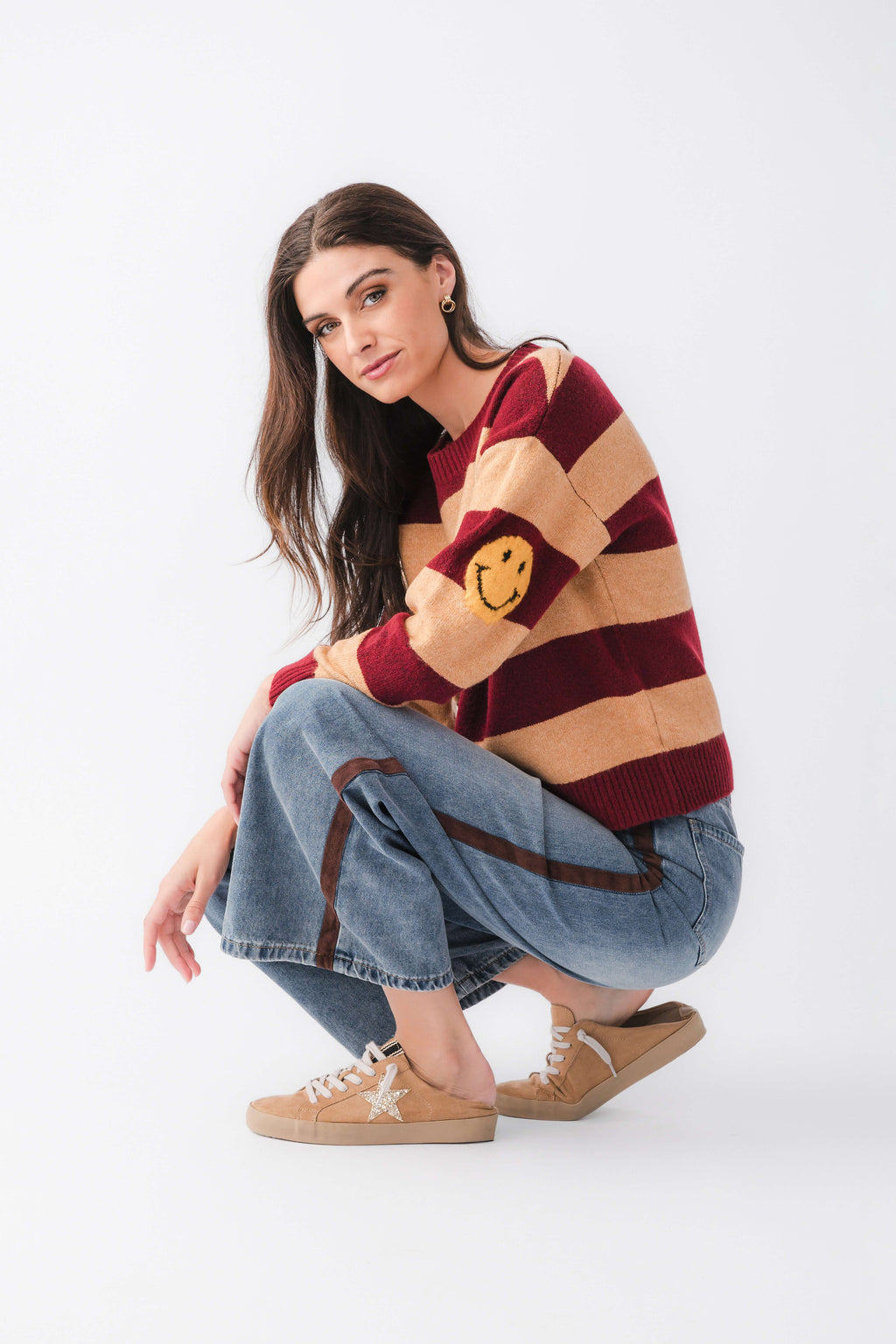 Striped smiley face sweater, burgundy and camel stripes with knit cuffs and crew neck