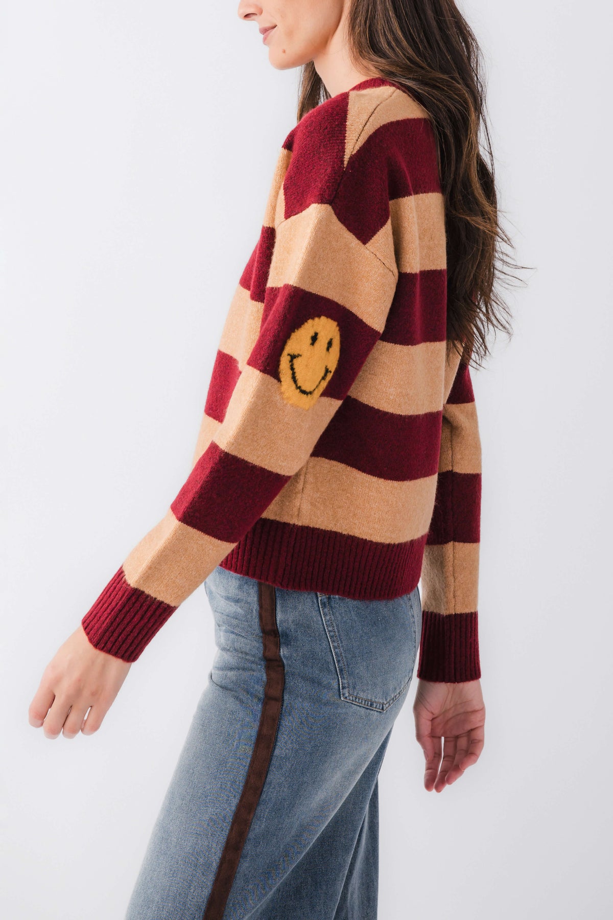 Striped sweater with smiley face patch, burgundy and camel horizontal knit, long sleeves