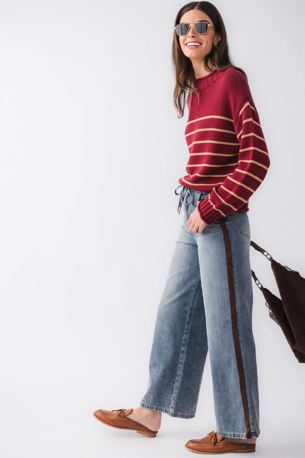 Burgundy striped knit mockneck sweater, front three-quarter view