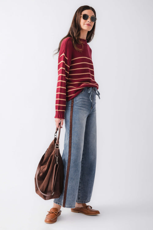 Wide-leg denim jeans with outer-leg varsity stripe and drawstring waistband, light wash