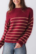 Burgundy striped knit mockneck sweater with long sleeves and ribbed neckline