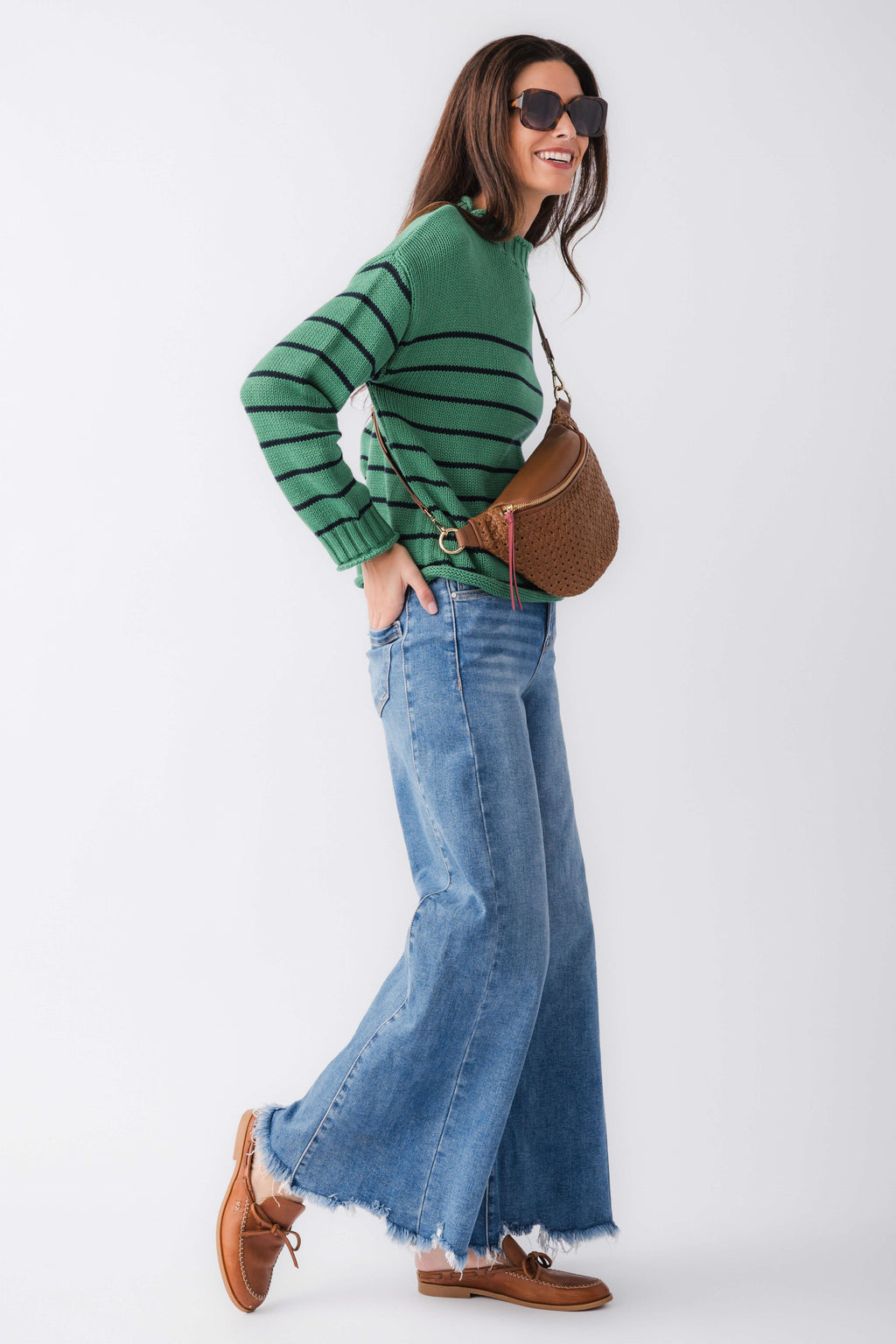 Green striped knit mockneck sweater, side front view with ribbed neckline